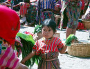 59 Girl learning the tricks of the trade from her mother at the market place 800