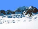 1 mountain peaks towering above a glacier in new zealand 800