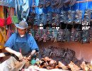 8 Mask maker cleaning the dust off his masks 800