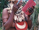 45 Tribal woman putting on her makeup 800